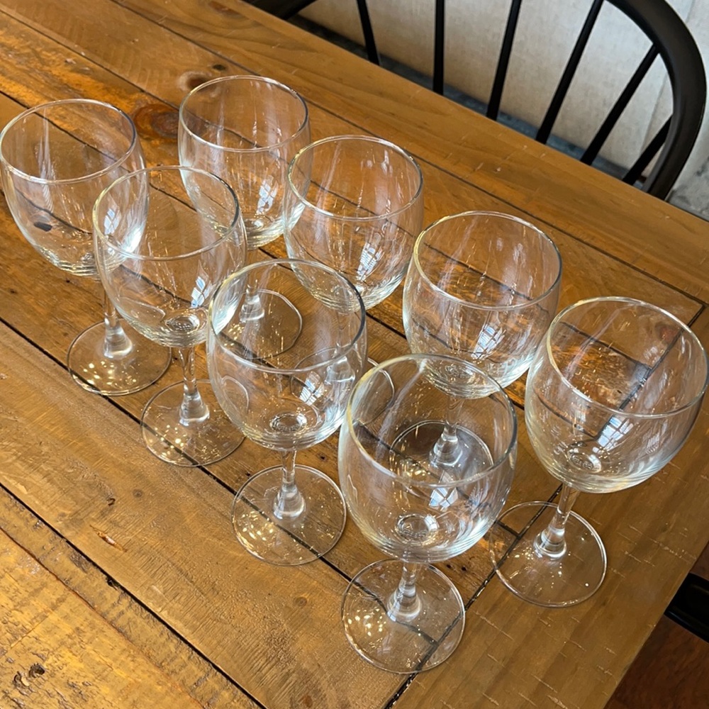 8 perfect condition wine glasses. Glass